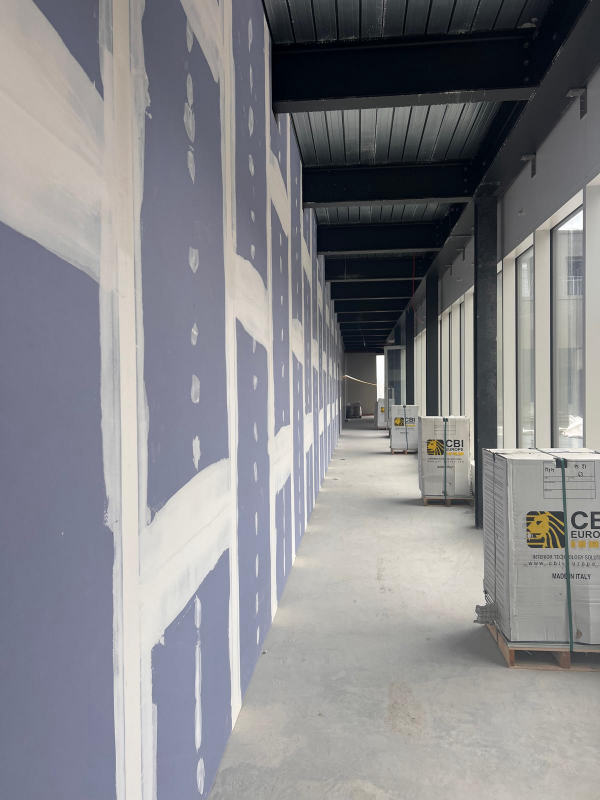 Cloisons hydrofuges bandées — Enduit des joints sur plaques haute résistance, chantier Ahmed Peintre Rénovation Sàrl