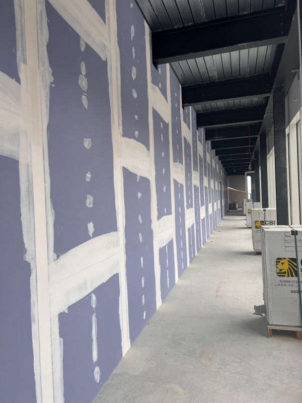 Traitement des joints en série — Longue paroi intérieure préparée pour la peinture, chantier Ahmed Peintre Rénovation Sàrl
